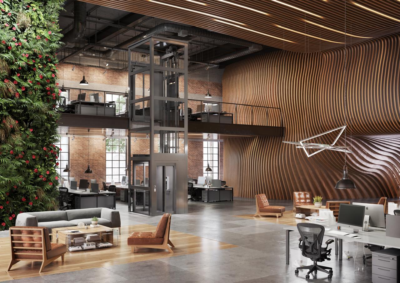 A platform lift with glass walls in a public building.